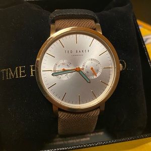 Men’s multifunction gold watch with leather band